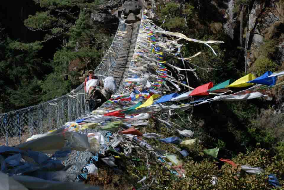 Prayer flags along a bridge on the Everest Base Camp trek