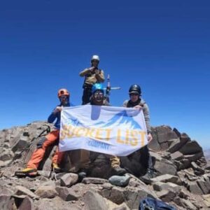 Bucket List Company climbers celebrating on the summit of Mount Aconcagua