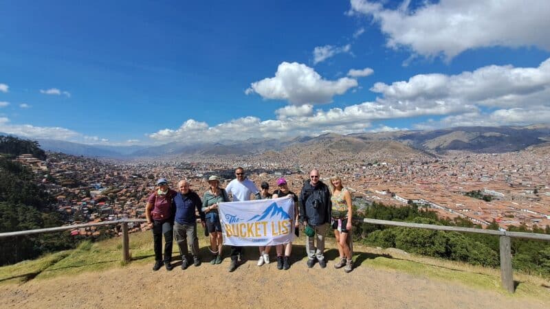 Bucket List Company group overlooking Cusco city from a scenic viewpoint