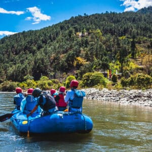 Punakha Bhutan Tourists ride on the rafting facility providing an interesting experience for travel enthusiasts