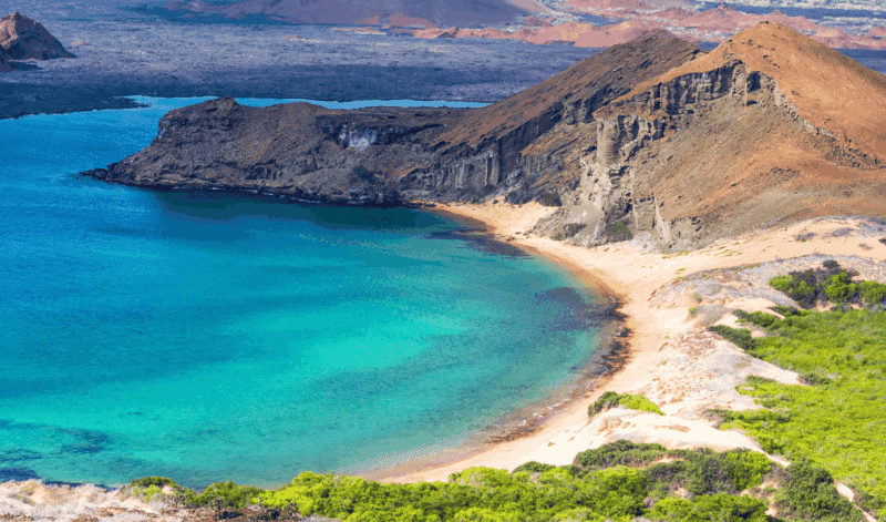 Volcanic coastline and secluded bay in the Galápagos Islands