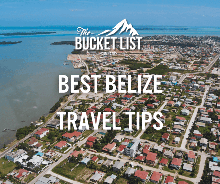 Aerial view of a coastal Belizean town with colorful houses and sparkling water in the background Overlaid text reads: "The Bucket List Company: Best Belize Travel Tips " Discover the best Belize travel tips for your next adventure