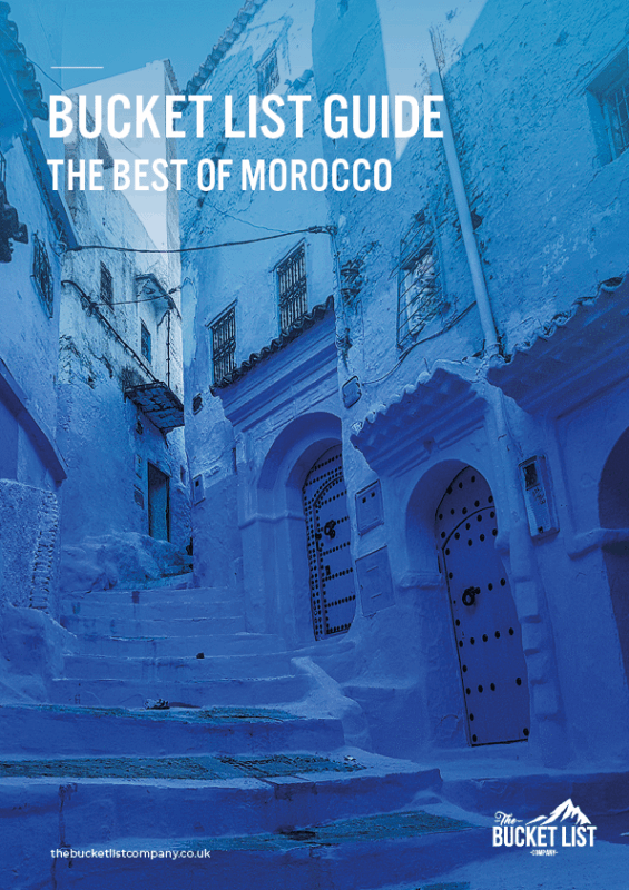 Bucket List Guide cover for the Best of Morocco showing blue streets and arched doorways in Chefchaouen.