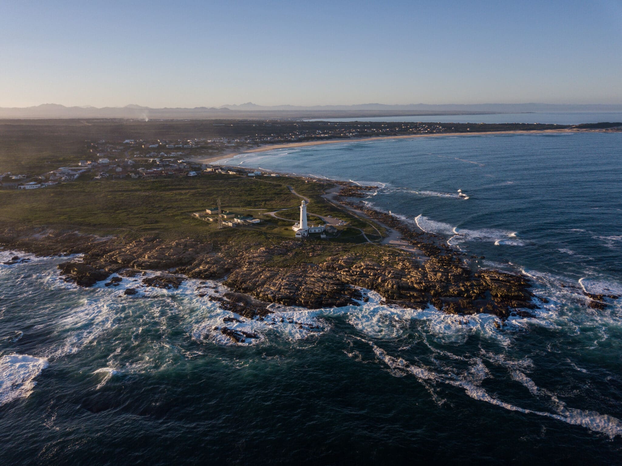 drone photo of Cape St. Francis lighthouse and the bay